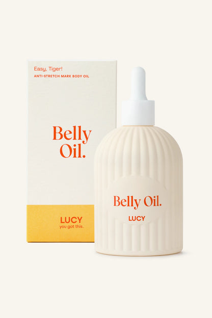 Duża butelka olejku LUCY Belly Oil 250 ml obok kartonowego opakowania Easy, Tiger!